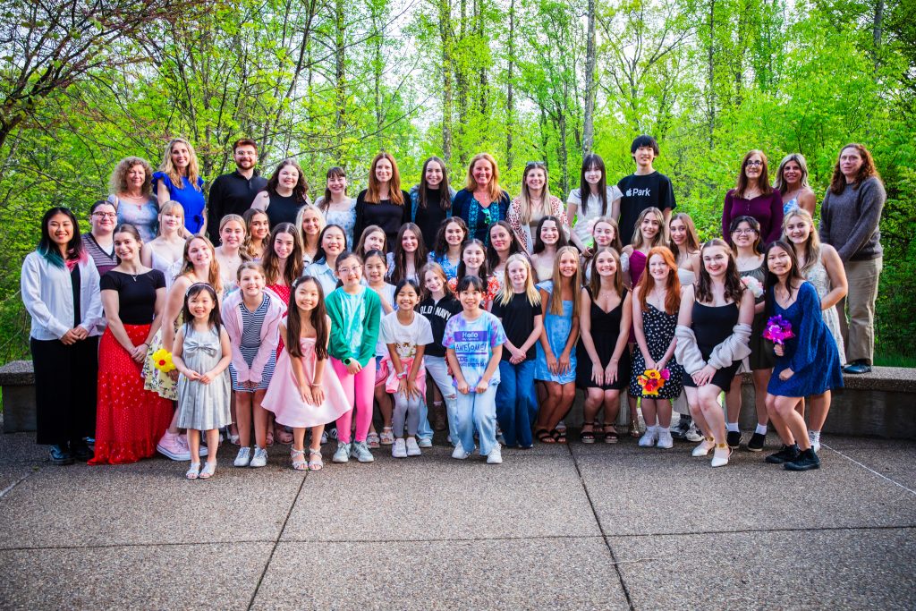 Group of skaters and coaches outside of 2025 Banquet